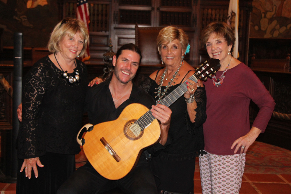 Penny Jenkins, left, Sharon Gordon and Joanie Chackel with local Billboard recording artist and composer Chris Fossek.