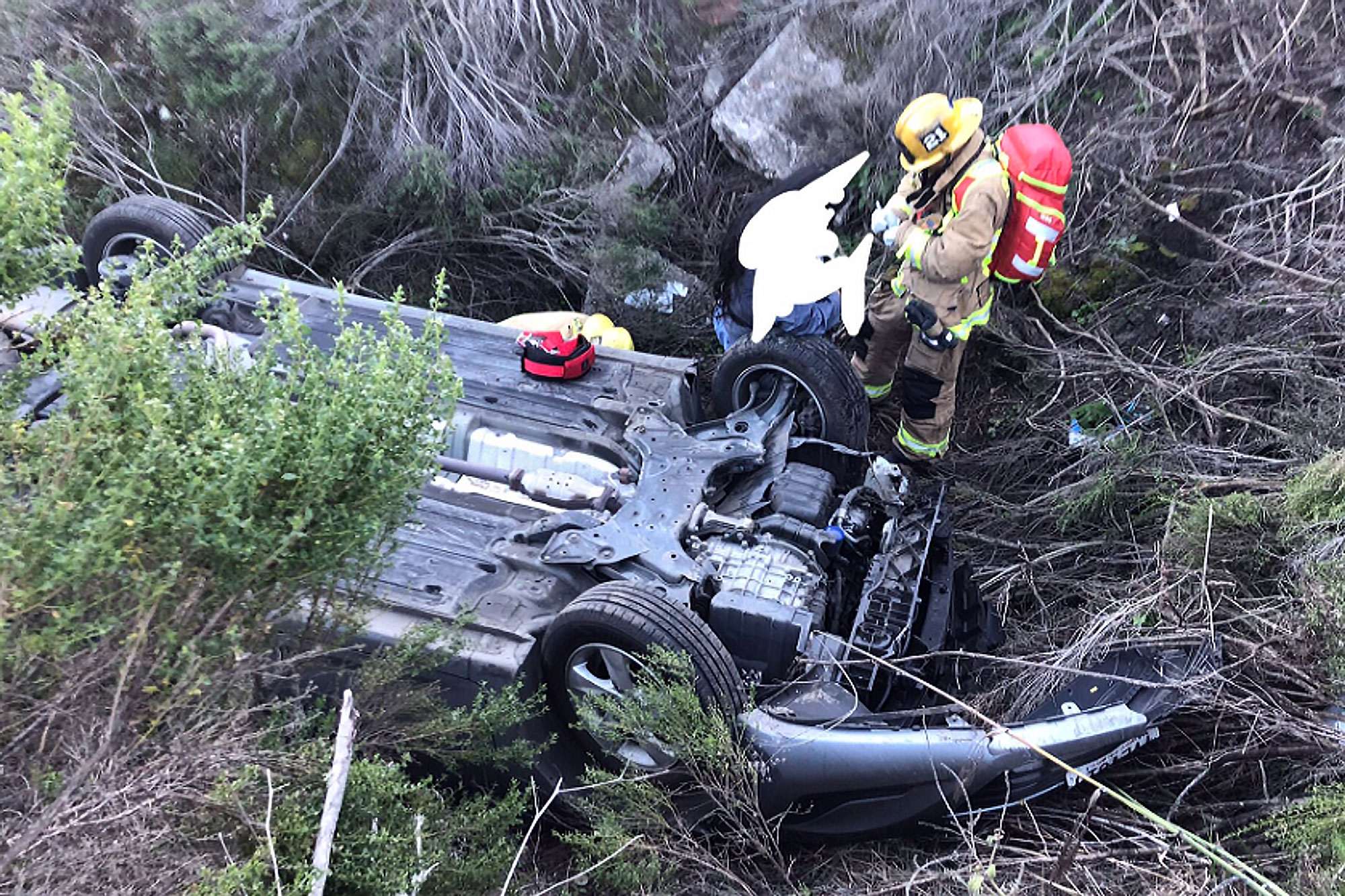 Driver Injured as Vehicle Plunges 100 Feet Down Embankment Near Los ...