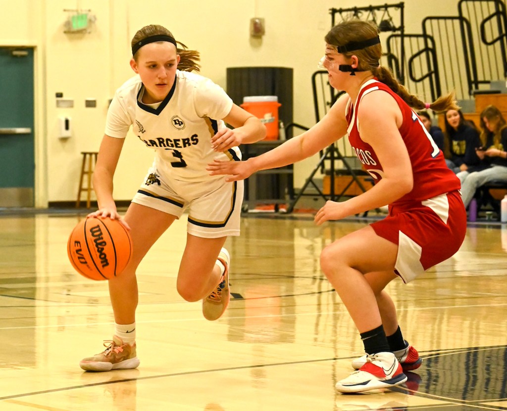Carly Letendre of Dos Pueblos is guarded by Carly Nielsen of San Marcos